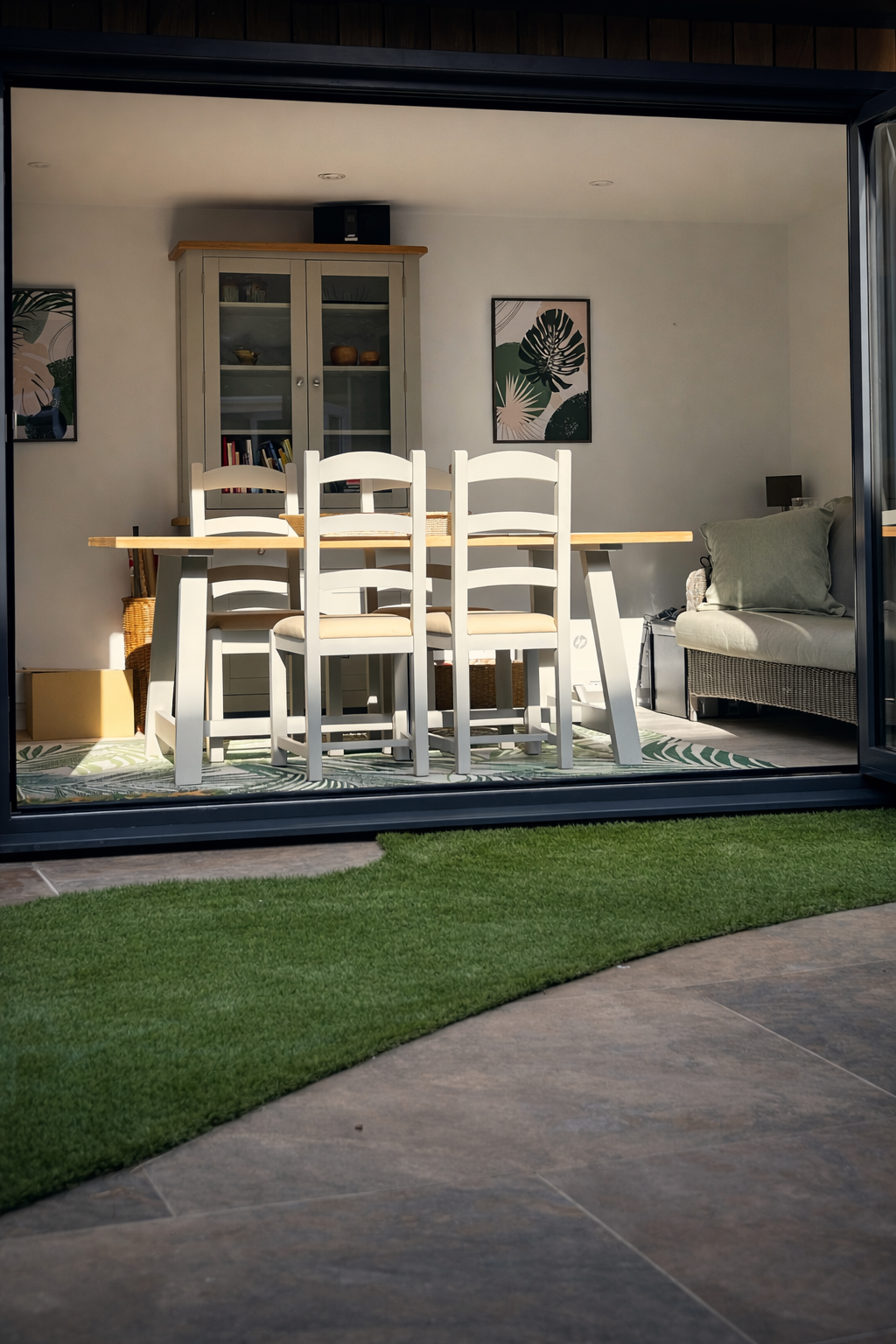 Garden room and terrace integrated into the wider garden design